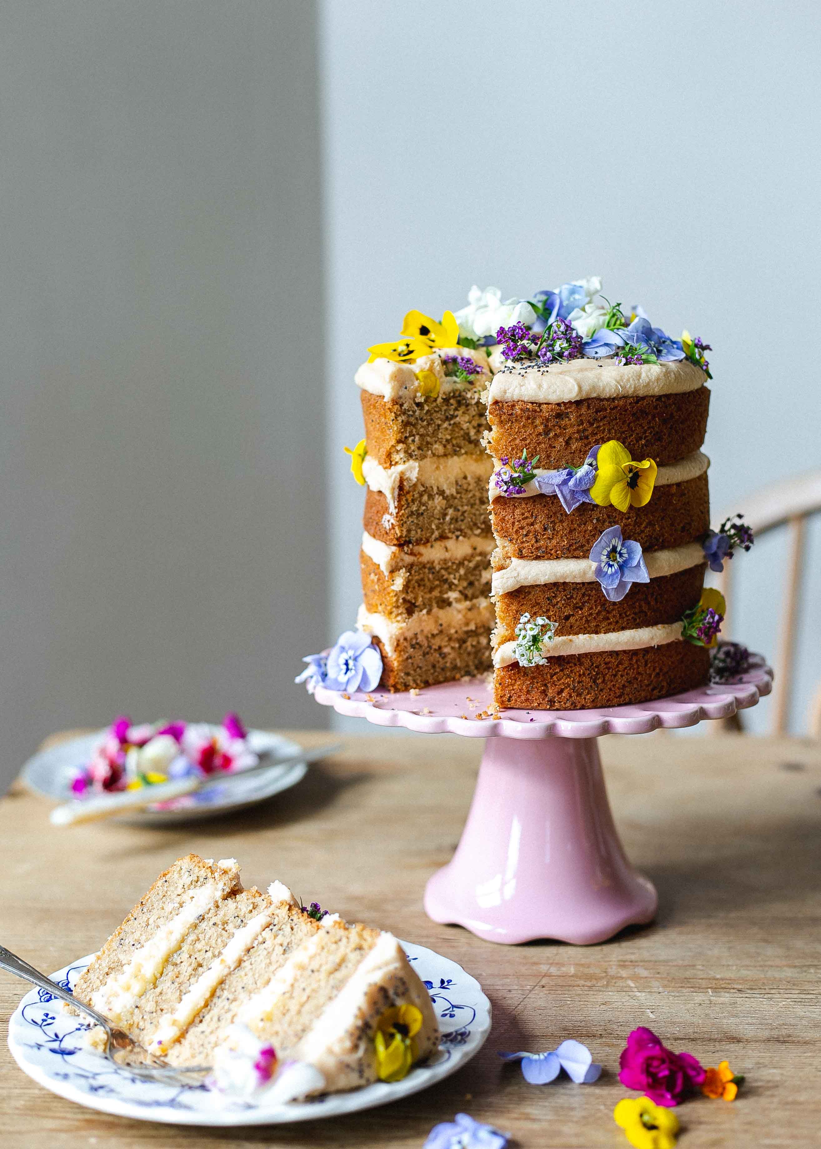 Slice of FODMAP friendly earl grey, lemon and poppy seed mother's day cake