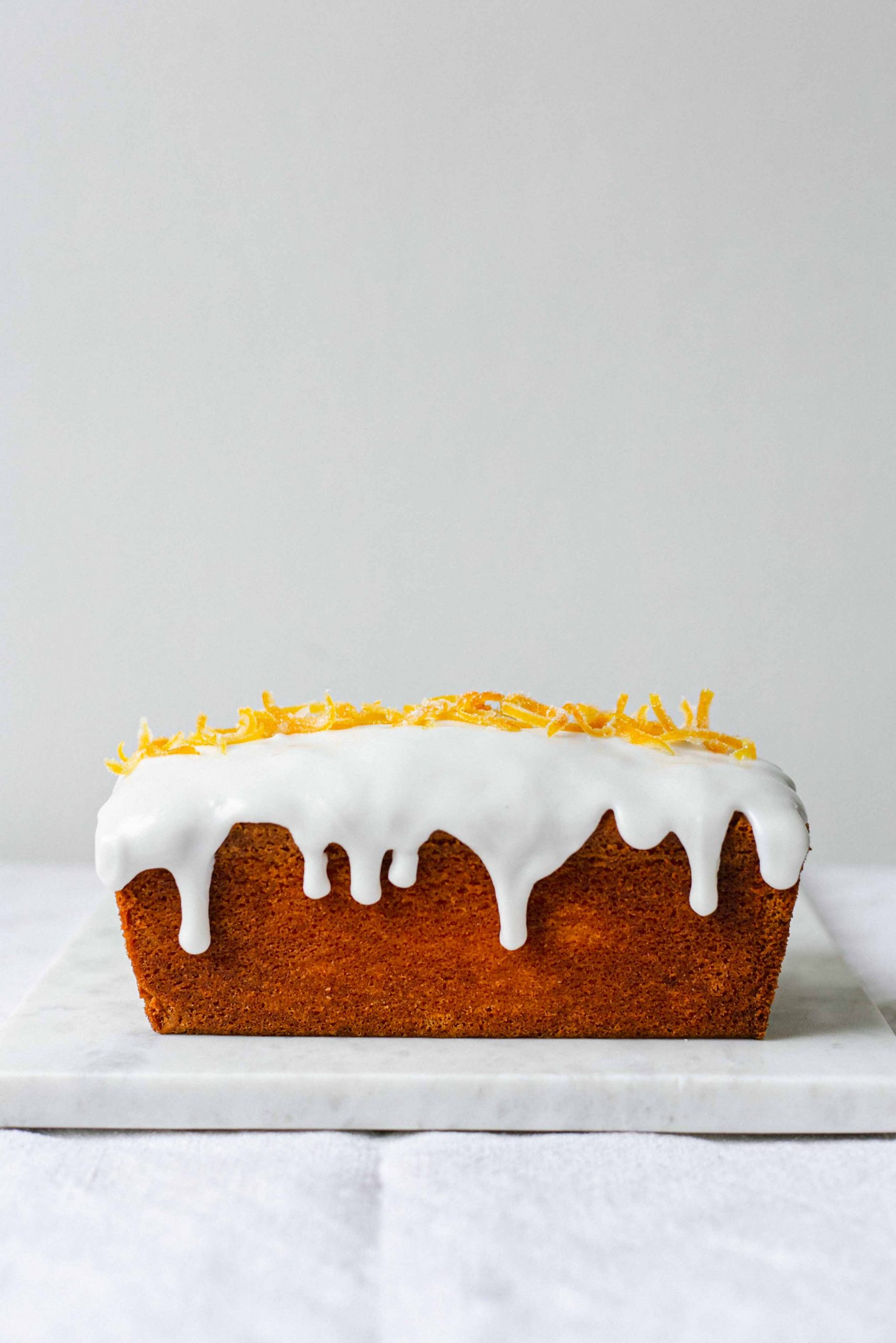 Low FODMAP lemon drizzle loaf cake side on