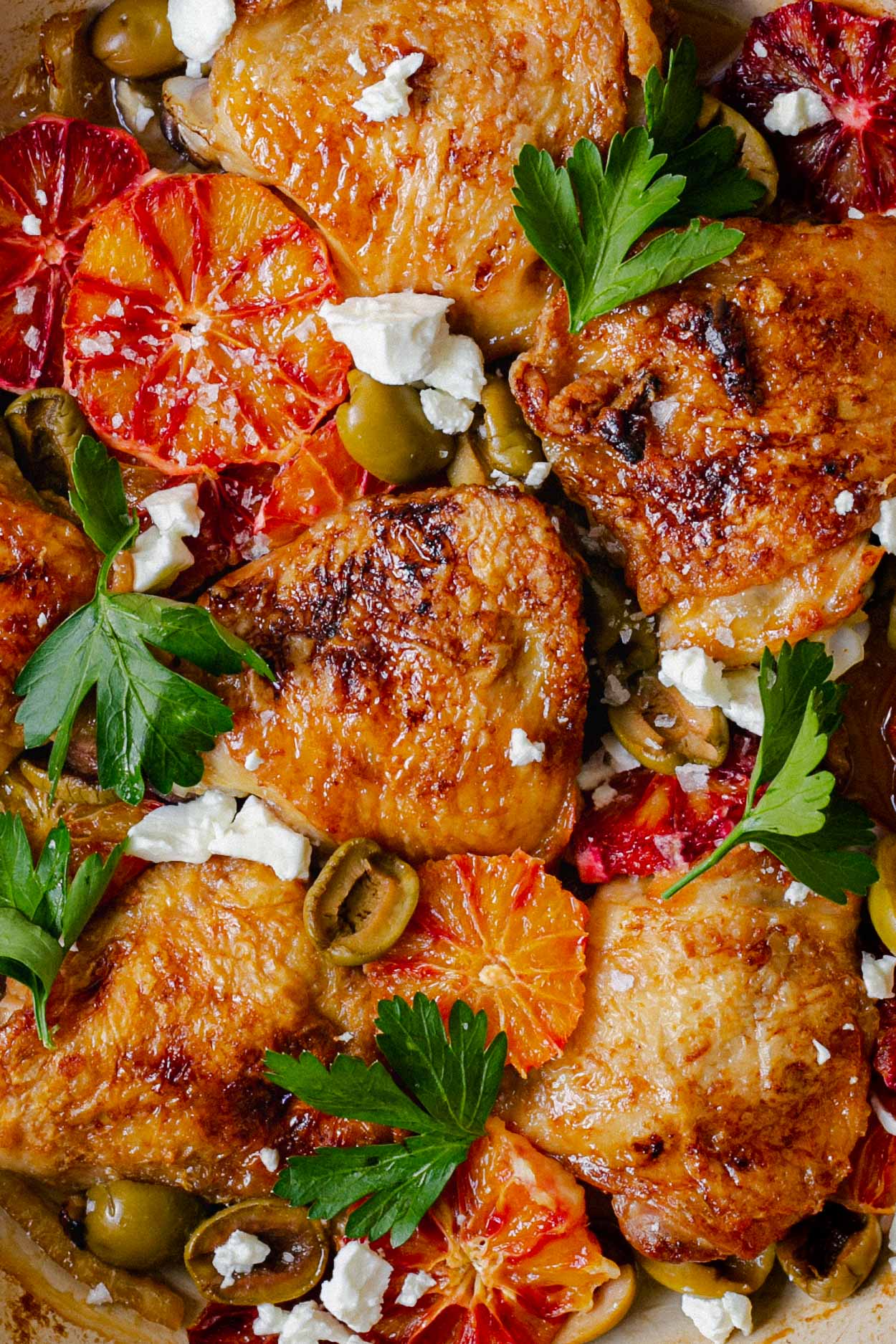 Close up of low FODMAP chicken thighs with blood orange