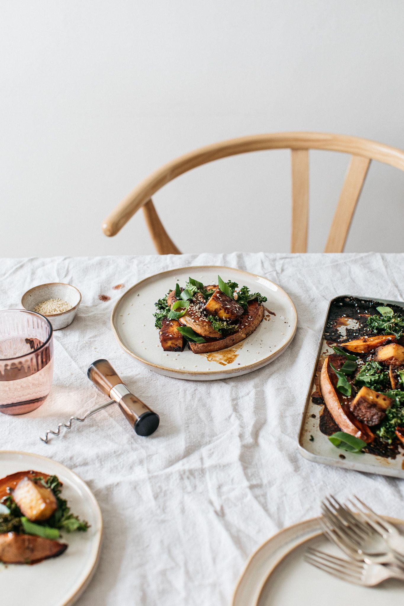 Vegan and low FODMAP roast sweet potato recipe on dinner table